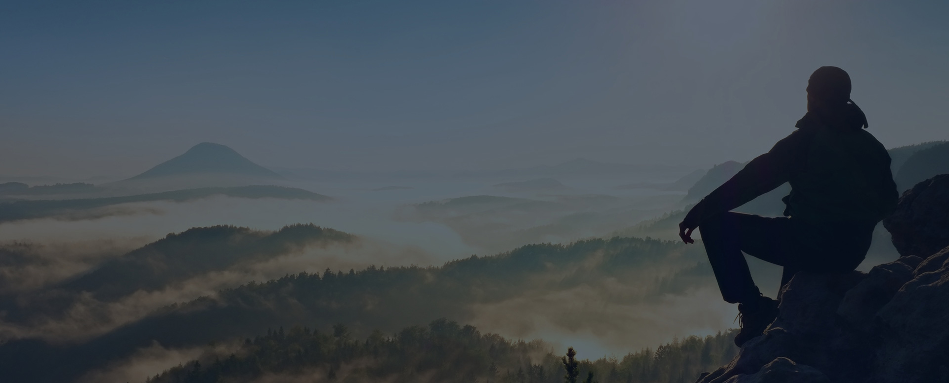 Man overlooking mountains